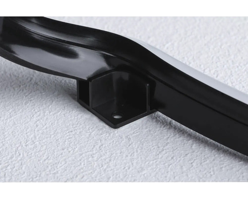 Gros plan d''une cornière noire avec fixation