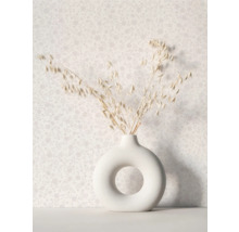 Fleurs séchées décoratives dans un vase rond
