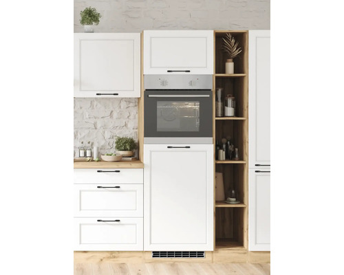 Scène de cuisine avec des armoires blanches et un four intégré