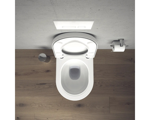 Vue de dessus de toilettes avec couvercle ouvert, support de papier toilette et plaque de commande.