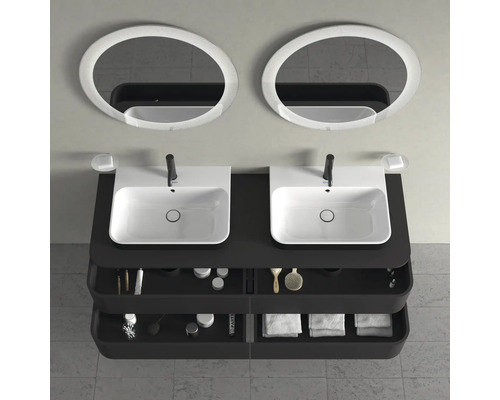 Meuble-lavabo double avec deux vasques, robinets, porte-savons, deux miroirs ronds et compartiments de rangement pour les accessoires de salle de bains.