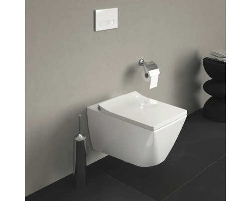 WC suspendu avec support papier toilette et plaque de commande dans une salle de bains.