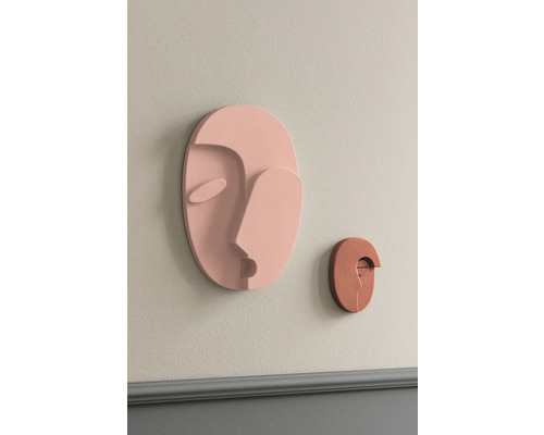 Deux décorations murales au design abstrait de visage