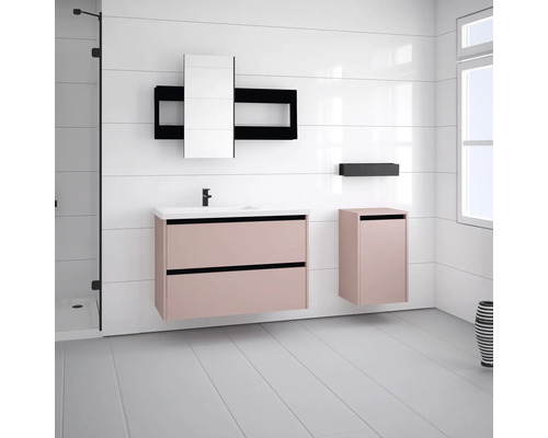 Badezimmer mit Waschtisch, Spiegelschrank und Hochschrank in hellem Farbton vor weisser Wand