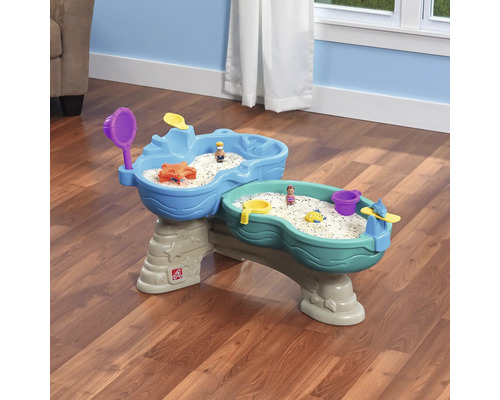 Table à sable et à eau pour enfants avec accessoires à l''intérieur.