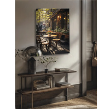 Wandbild mit Cafészenen über einem Konsolentisch im Wohnzimmer