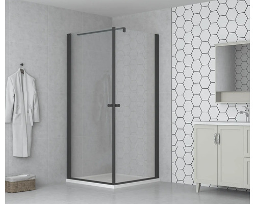 Cabine de douche à l''italienne avec porte pivotante et lavabo dans salle de bains