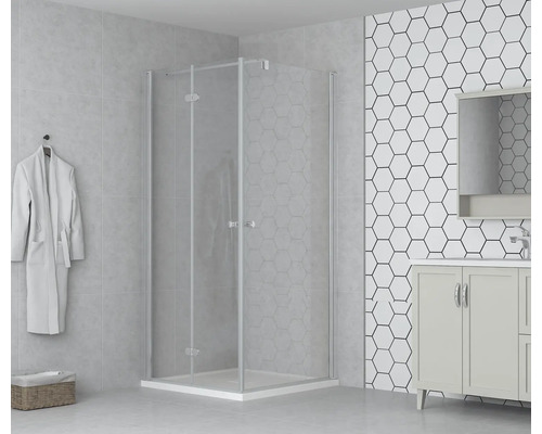 Salle de bains avec cabine de douche, meuble sous-lavabo et peignoir au mur