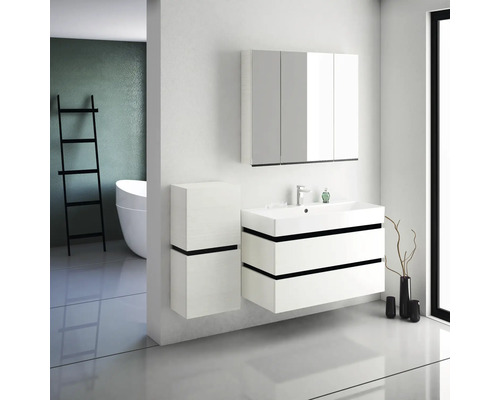 Salle de bains moderne avec meuble sous-lavabo, armoire de toilette et élément d''armoire supplémentaire.