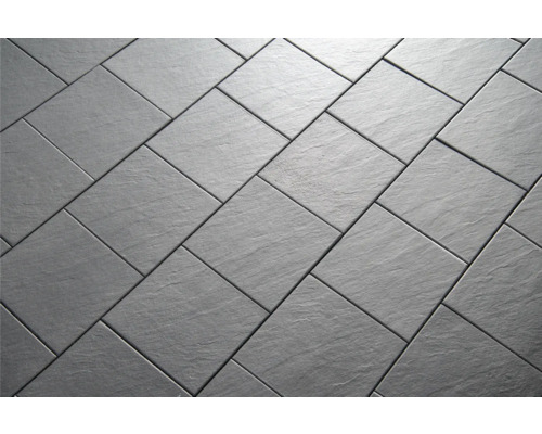 Pose détaillée de carreaux de sol