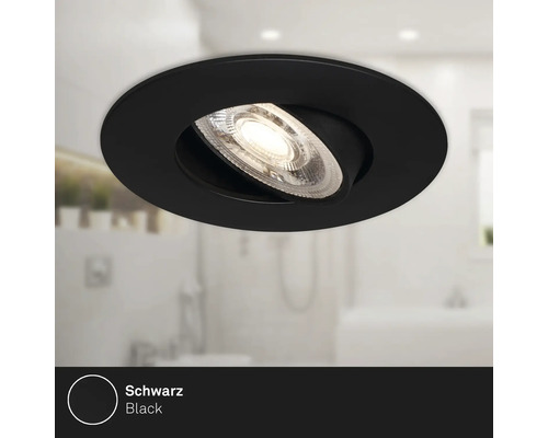 Schwenkbarer Einbaustrahler in runder, schwarzer Ausführung für den Innenbereich
