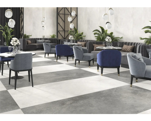 Restaurant avec fauteuils, tables et carrelage à damier