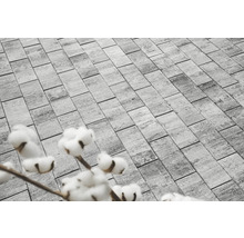 Des pavés gris forment un motif pour l''extérieur