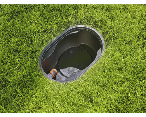 Boîtier d''arroseur escamotable dans la pelouse