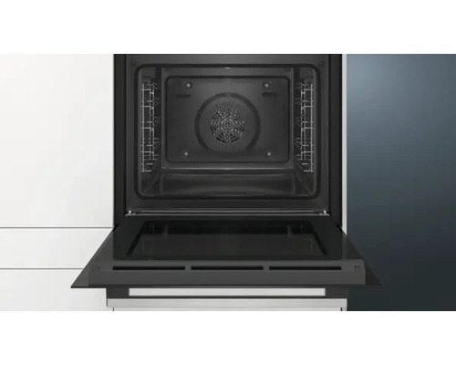 Vue intérieure d''un four avec porte ouverte