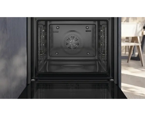 Vue intérieure d''un four avec porte ouverte