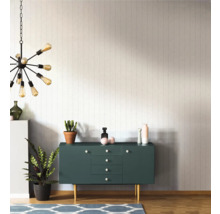 Salon avec commode, plantes d''intérieur, tapis et suspension