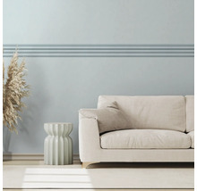 Salon lumineux avec canapé, table d''appoint et décoration