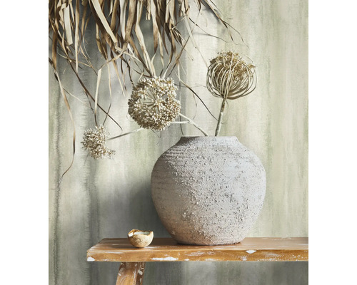 Dekoratives Stillleben mit Vase und getrockneten Blumen auf einem Tisch