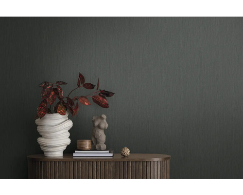 Gros plan d''un mur avec un papier peint légèrement texturé