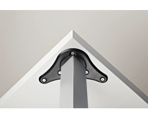 Gros plan sur un pied de table fixé à un plateau de table à l''aide d''un support noir, fixé par des vis.