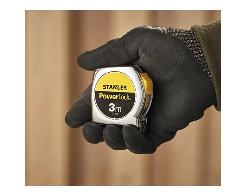 Mètre à ruban Stanley PowerLock, 3 mètres, dans une main