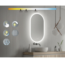 Salle de bain avec miroir éclairé, lavabo et réglage de la température