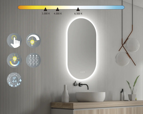 Salle de bain avec miroir éclairé, lavabo et réglage de la température