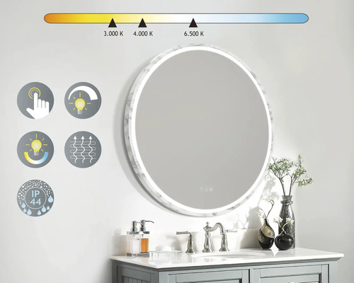 Miroir LED rond avec capteur tactile pour le contrôle de la lumière et indice de protection IP44 dans la salle de bain.
