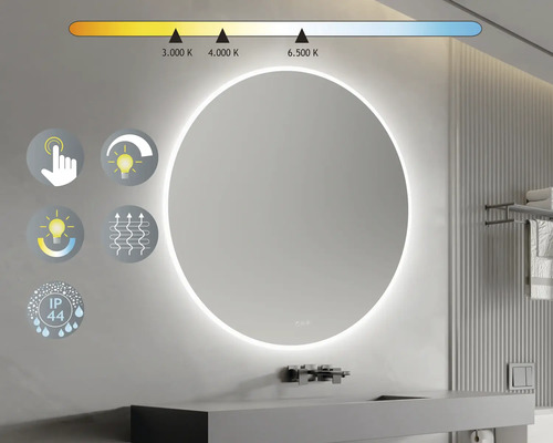 Miroir de salle de bain rond avec éclairage et fonction tactile dans une salle de bain