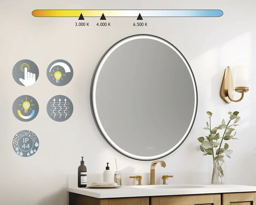 Miroir rond avec éclairage LED dans une salle de bains avec lavabo