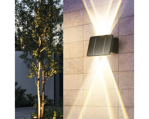 Applique murale solaire avec rayons lumineux sur un mur de maison