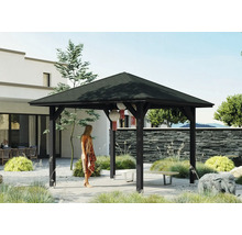 Pavillon avec toit en pierre dans un jardin