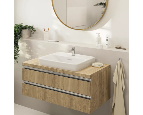 Badezimmer Lavabo mit Holzunterschrank und rundem Spiegel