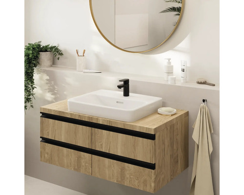 Modernes Badezimmer mit Waschtischunterschrank, Aufsatzwaschbecken und rundem Spiegel