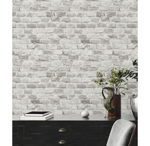 Papier peint à motif de pierres et mobilier