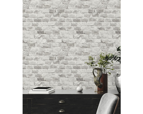 Papier peint à motif de pierres et mobilier