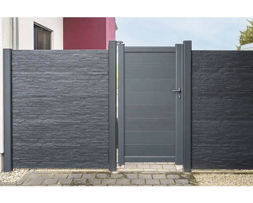 Clôture de jardin grise avec porte et aspect pierre