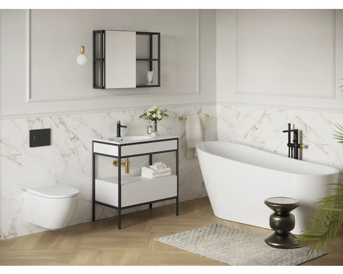Salle de bains avec lavabo, miroir, toilettes et baignoire îlot au design clair