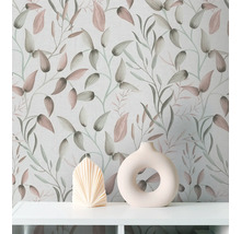 Papier peint décoratif avec motif floral, combiné avec un vase et une bougie sur une étagère