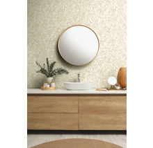 Salle de bains avec meuble sous-lavabo, miroir rond et papier peint floral