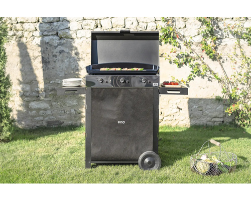 Barbecue Eno avec étagères et roues dans le jardin