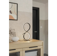 Dekorative Tischleuchte im modernen Design auf einem Holzschrank