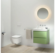 Salle de bains moderne avec WC suspendu, meuble sous-lavabo vert et miroir rond avec éclairage