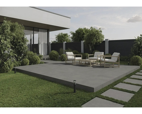 Terrasse moderne avec mobilier de jardin et dalles en pierre