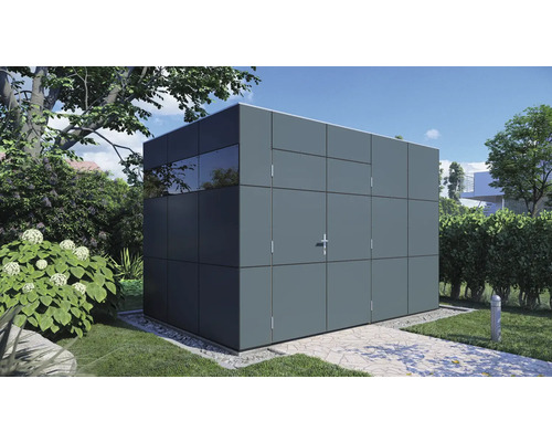 Box de jardin moderne en métal avec fenêtre et porte dans le jardin