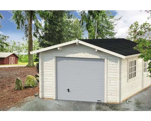 Garage en bois avec porte sectionnelle et toit à deux pentes en extérieur