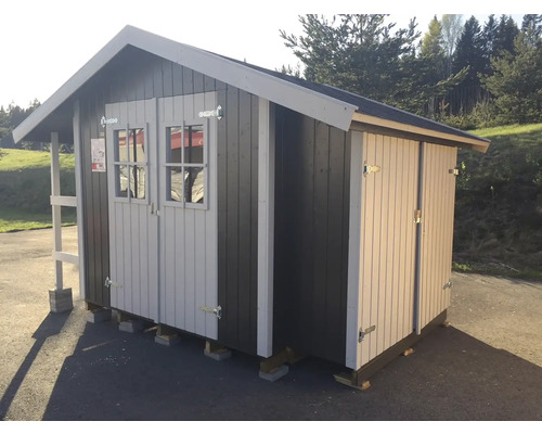 Abri de jardin en bois avec double porte et auvent