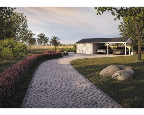 Allée avec pavés, garage avec abri de voiture et deux voitures dans le jardin.
