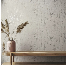 Mur avec papier peint texturé, table et vase avec de l''herbe sèche